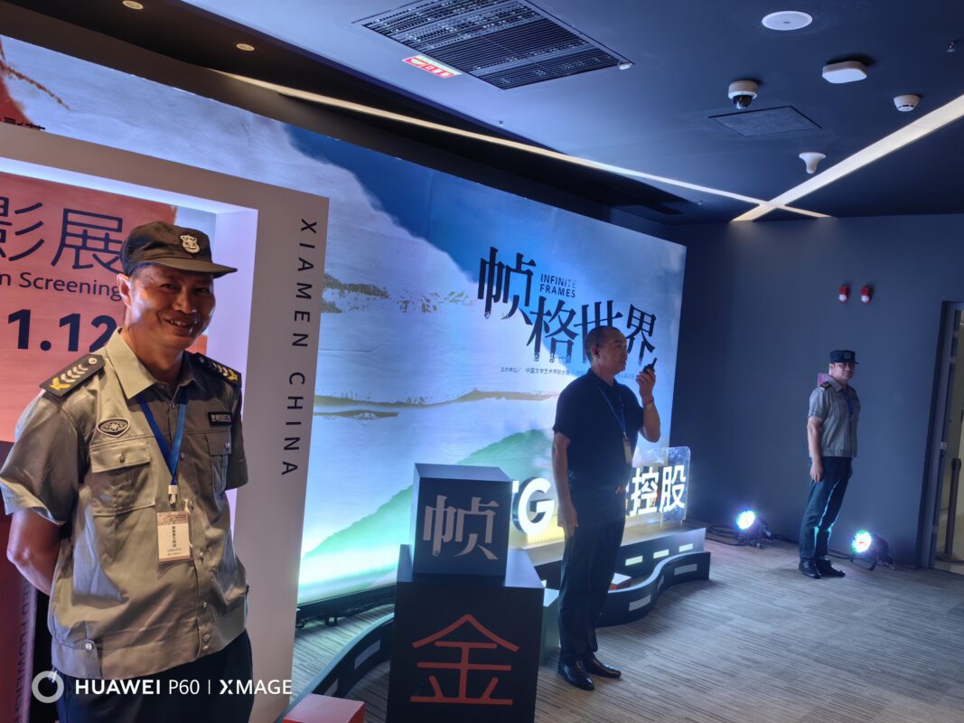 Security personnel using Lenovo business walkie-talkies at the 2023 Golden Rooster Awards in amoy for effective communication.